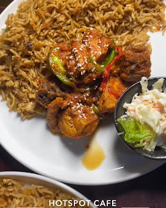 Fried rice with sesame peppered chicken and coleslaw